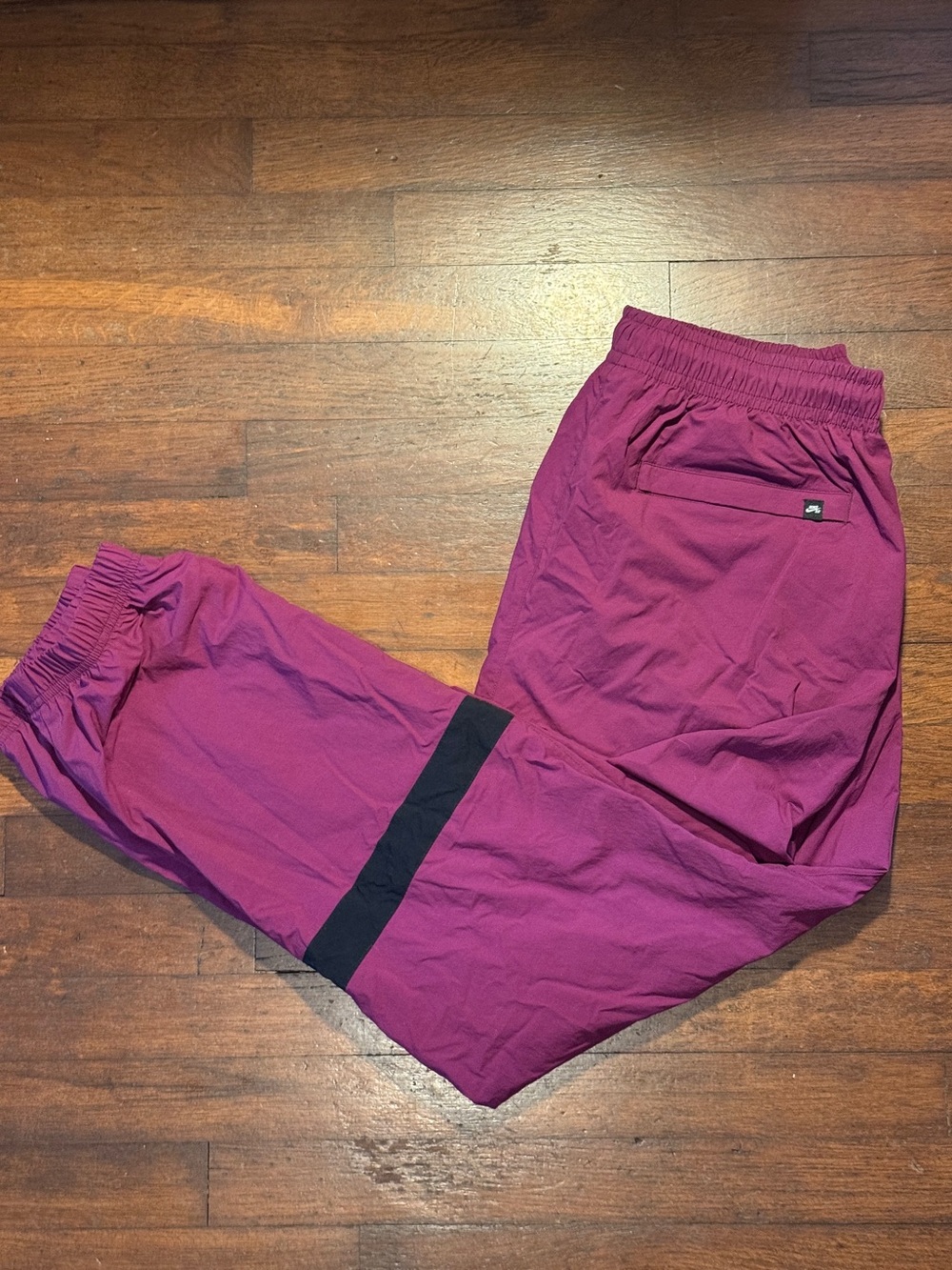 Nike SB Windbreaker Track Pants in Magenta